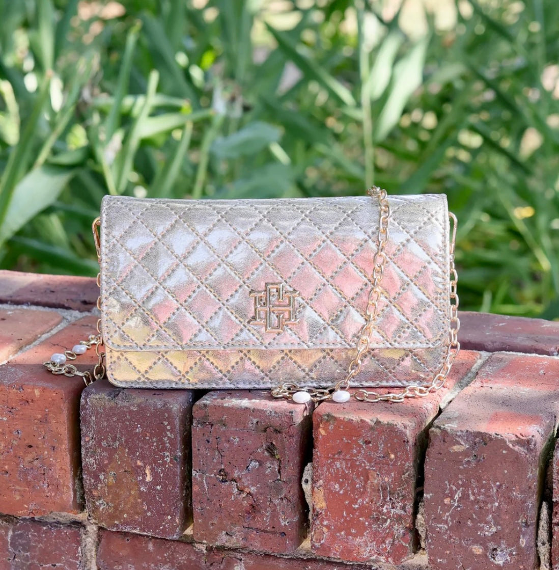 Gold Caroline Hill clutch crossbody